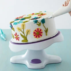 Wilton Tilt-N-Turn Ultra Cake Turntable - Cake Decorating Stand -Wilton Store ppi9clwuqy7og73spivb 39297.1691133059